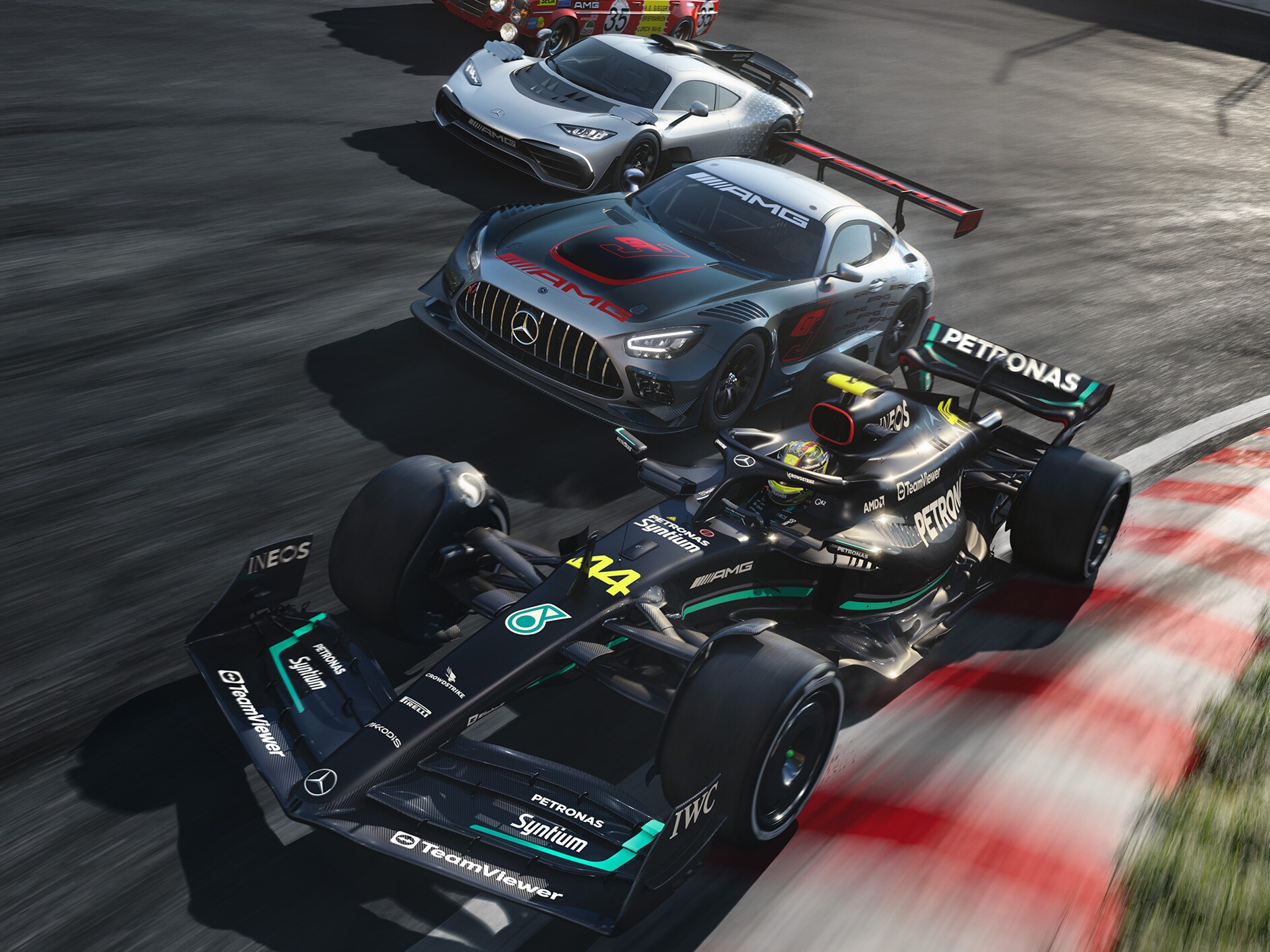 한 레이스 트랙 위에 선 여러 대의 Mercedes-AMG 스포츠카